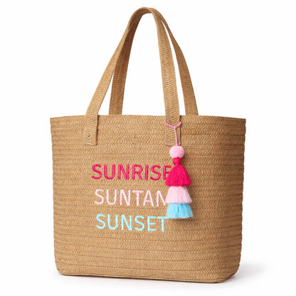 Raffia Message Beach Bag: Sunrise, Suntan, Sunset with Tassel on a white background.