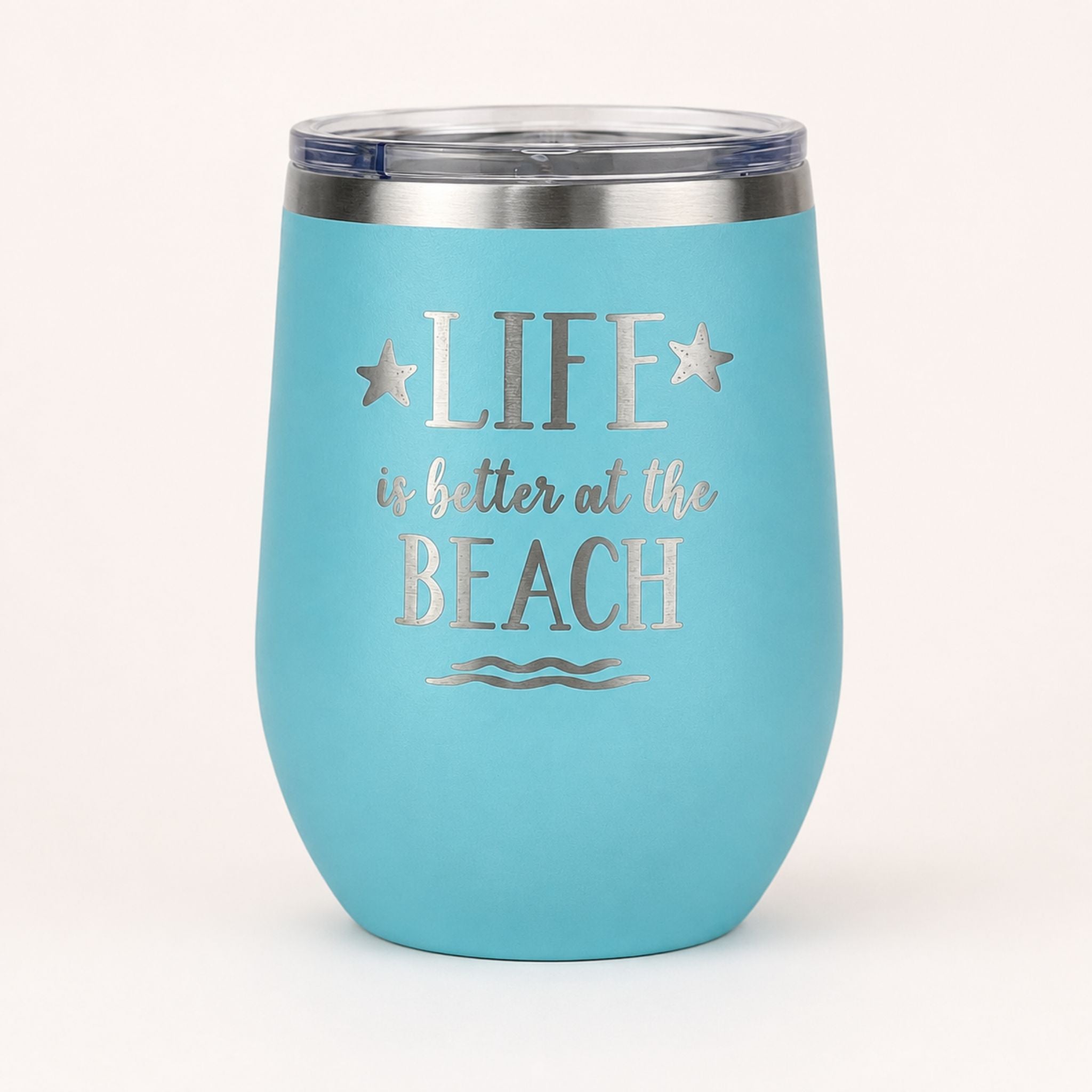 Teal beach insulated wine tumbler with lid on a clean light background