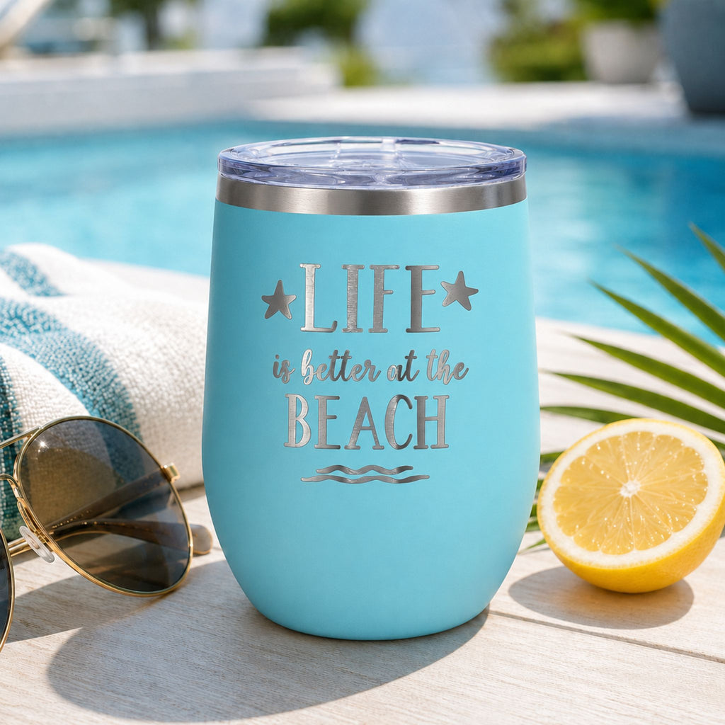 Teal beach insulated wine tumbler with lid in a refreshing poolside cold drink setting