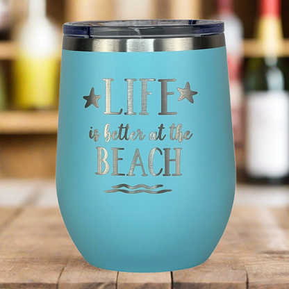 12 oz teal, engraved, "Life is better at the beach" insulated metal wine tumbler with lid is perfect for keeping wine the right temperature