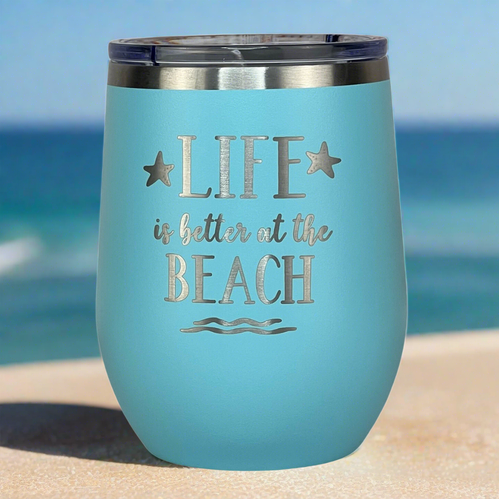 12 oz teal, engraved, "Life is better at the beach" insulated metal drink tumbler with lid keeps drinks hot or cold