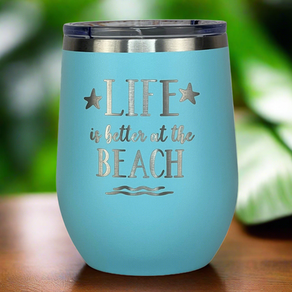 12 oz teal, engraved, "Life is better at the beach" insulated metal drink tumbler with lid keeps drinks hot or cold