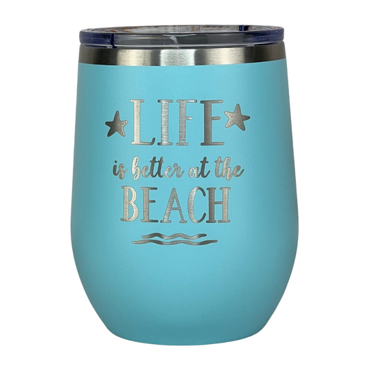 Close-up of teal "Life is Better at the Beach" engraved wine tumbler with lid