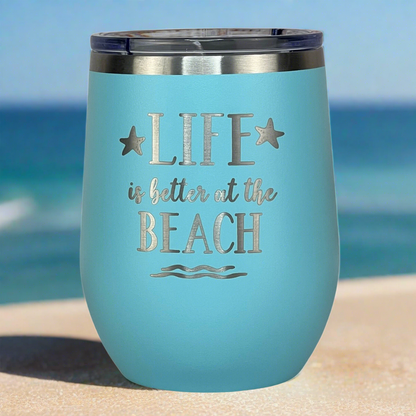 Close-up of teal tumbler lid and engraved design