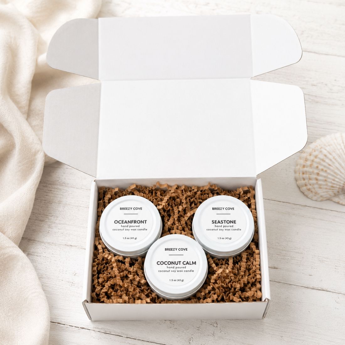 What’s included in the Beachside Mini Candle Trio: three mini coconut soy wax candles in Oceanfront, Coconut Calm, and Seastone scents.