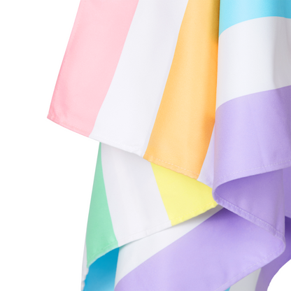 close-up of bright, pastel rainbow striped quick dry, sand free beach towel