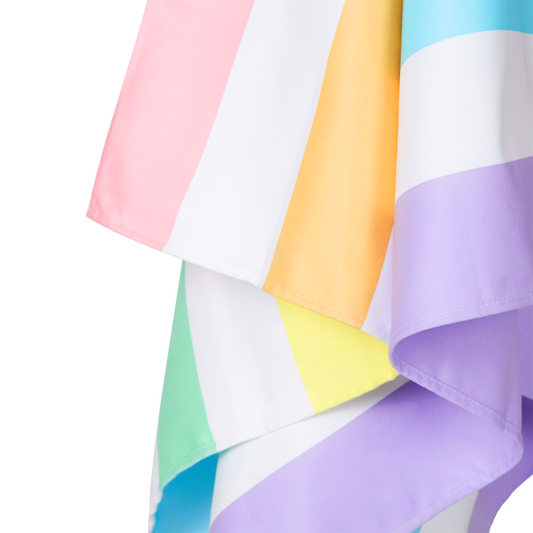 close-up of bright, pastel rainbow striped quick dry, sand free beach towel