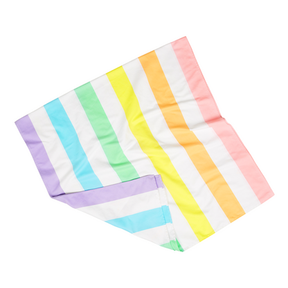 bright, pastel rainbow striped quick dry, sand free beach towel folded in half