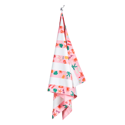 pink striped beach pattern, quick dry, sand free kids beach towel hanging on hook to dry