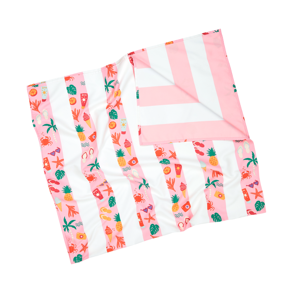 pink striped beach pattern, quick dry, sand free kids beach towel showing pink and white striped reverse side